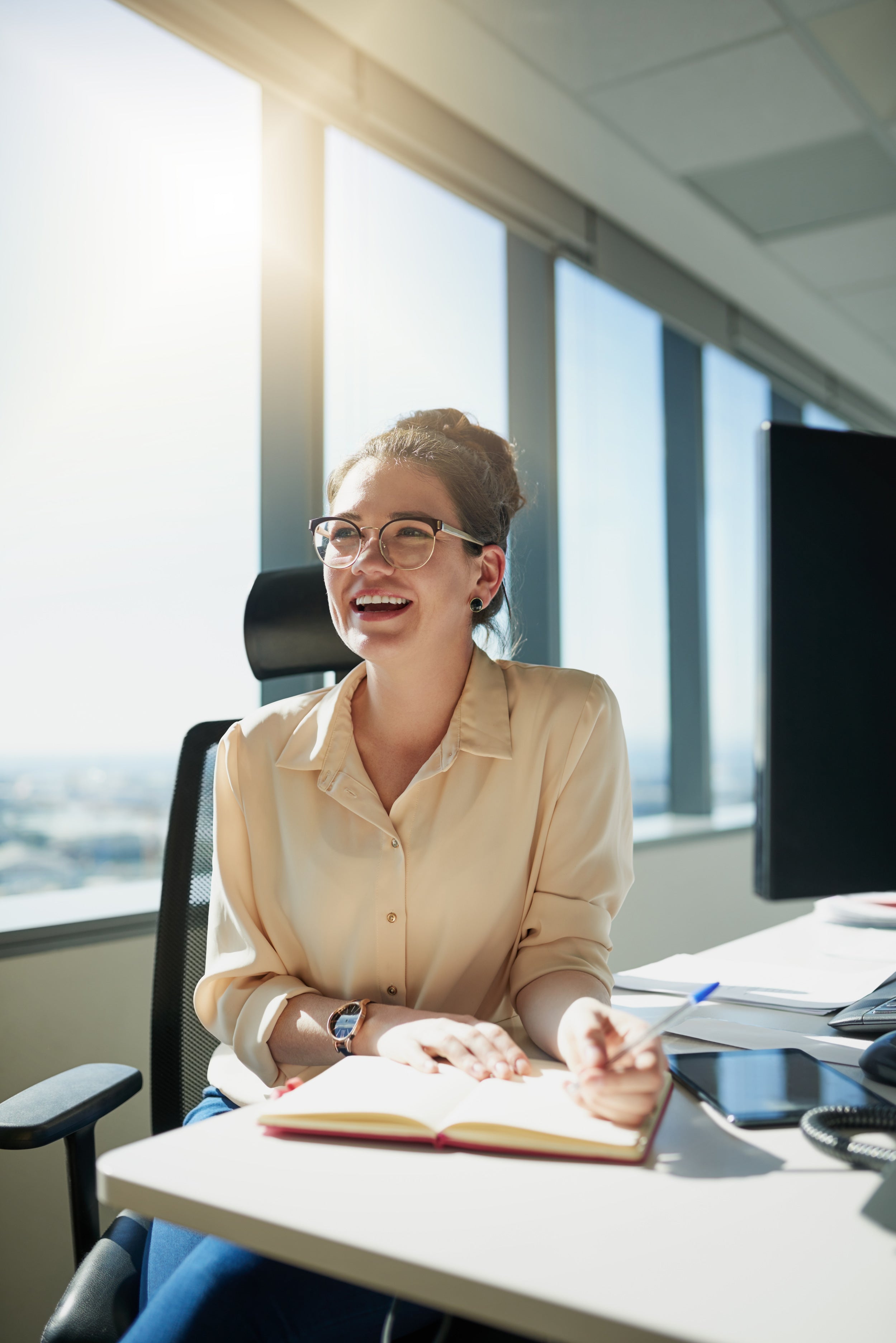 woman-notebook-desk-with-portrait-smile-pen-with-sunlight-office-finance-manager-accountant-budget-bookkeeping-audit-tax-company-professional-female-person.jpg